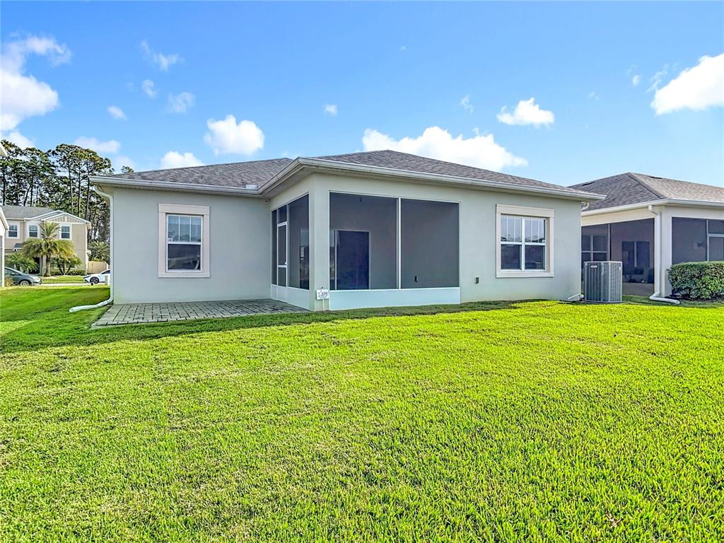 5644 Estero Loop Port Orange, FL 32128 - Photo 37 of 50 a house view with a outdoor space