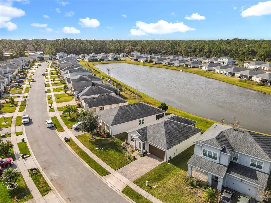5644 Estero Loop Port Orange, FL 32128 - Photo 40 of 50 an aerial view of a house with a swimming pool
