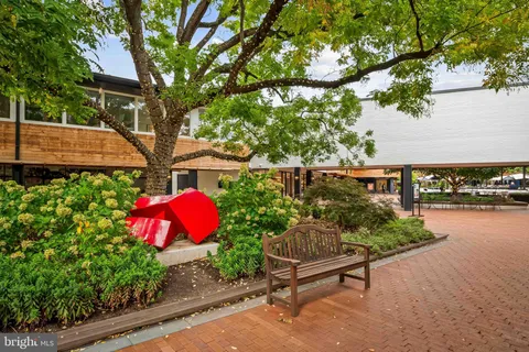 a garden view with a seating space