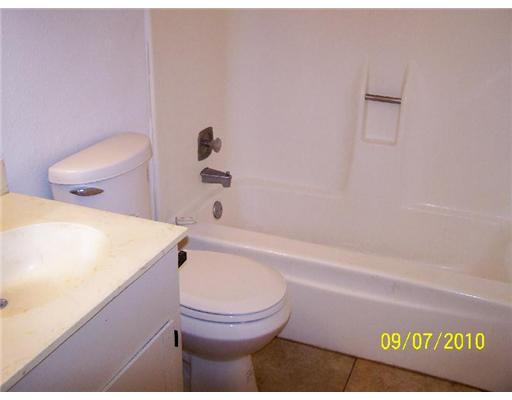 5011 Meandering Lane, Unit A Corpus Christi, TX 78413 - Photo 10 of 10 a bathroom with a toilet and a shower