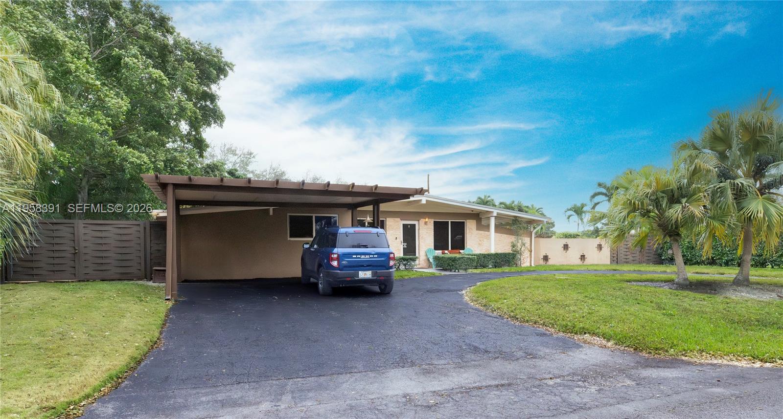 12415 Southwest 93rd Court Miami, FL 33176 - Photo 2 of 30 a view of house and outdoor space