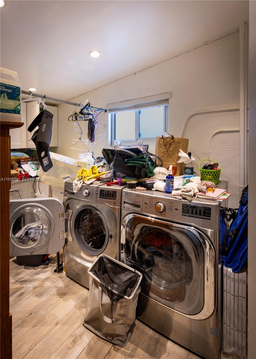 12415 Southwest 93rd Court Miami, FL 33176 - Photo 21 of 30 a utility room with sink dryer and washer