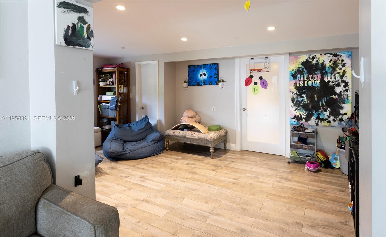 12415 Southwest 93rd Court Miami, FL 33176 - Photo 7 of 30 a bedroom with a bed and a couch