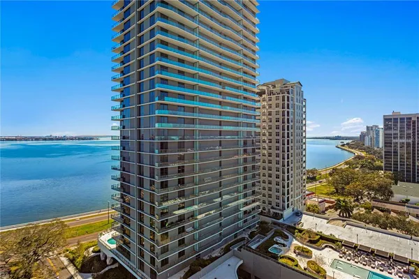 a view of a city with tall buildings