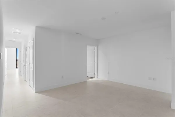 a view of a hallway with workspace