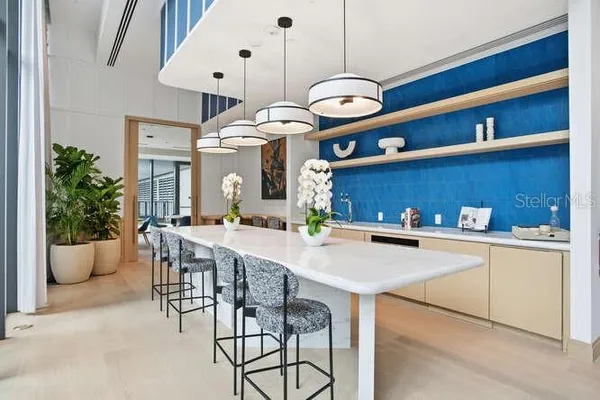 a living room with furniture and flat screen tv