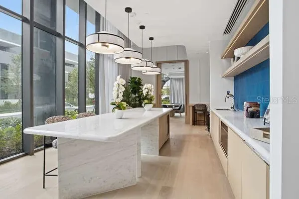 a view of living room with furniture and flat screen tv