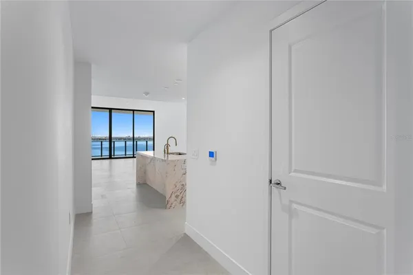 a bathroom with a double vanity sink toilet and shower