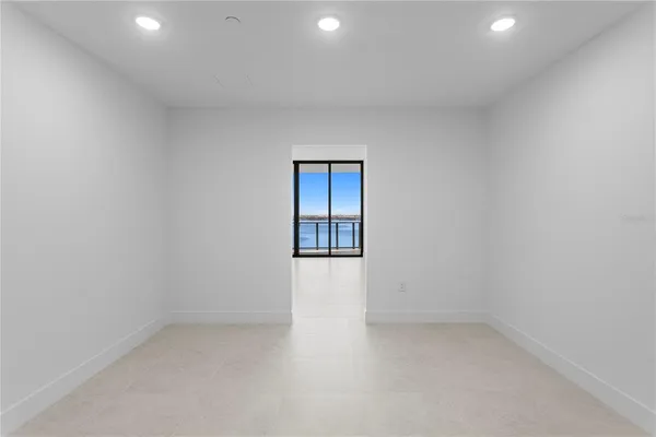 a spacious bathroom with a bathtub a shower and a sink