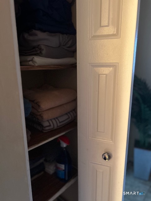 92 Angel Drive, Unit C Waterbury, CT 06708 - Photo 15 of 18 a stove top oven sitting inside of a kitchen