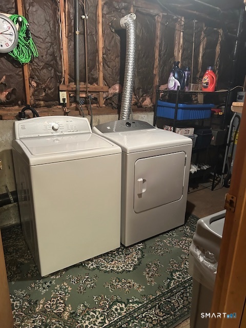 92 Angel Drive, Unit C Waterbury, CT 06708 - Photo 18 of 18 a utility room with dryer and washer