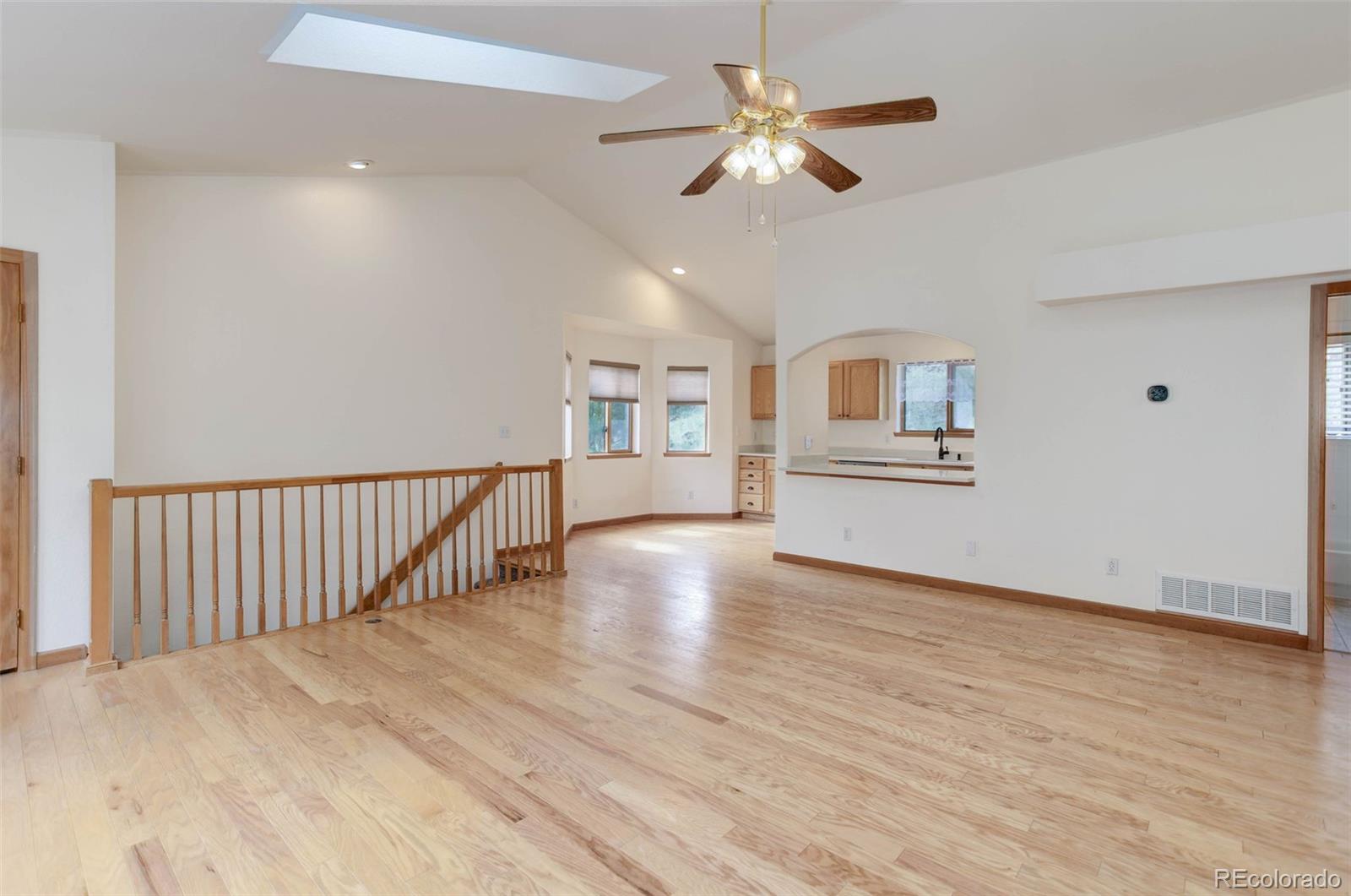 45 Catamount Ridge Road Bailey, CO 80421 - Photo 14 of 39 wooden floor in an empty room with a window