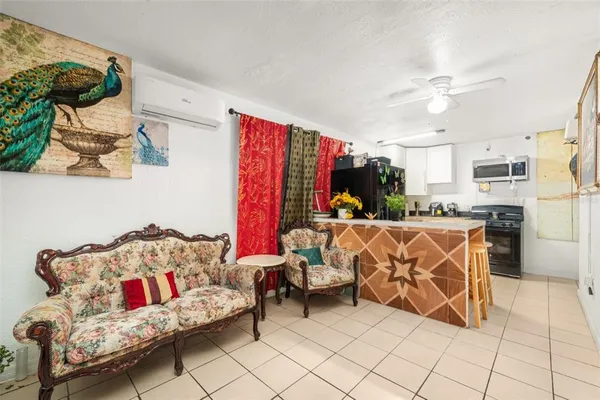 a living room with furniture and a couch