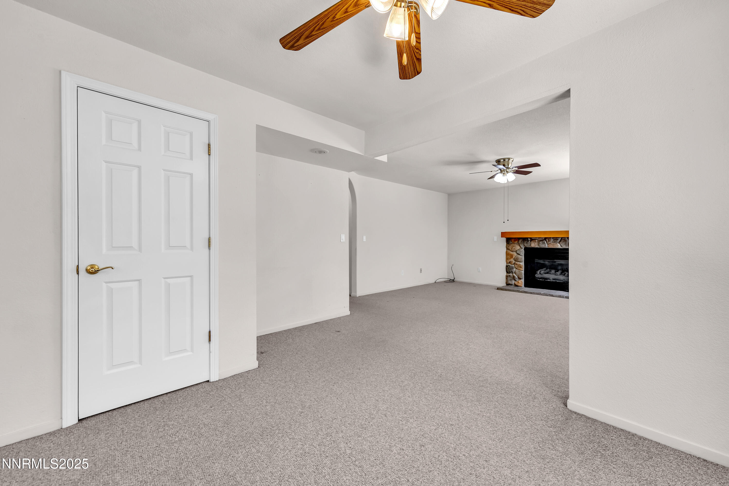1850 Tess Way Reno, NV 89511 - Photo 15 of 50 an empty room with a ceiling fan