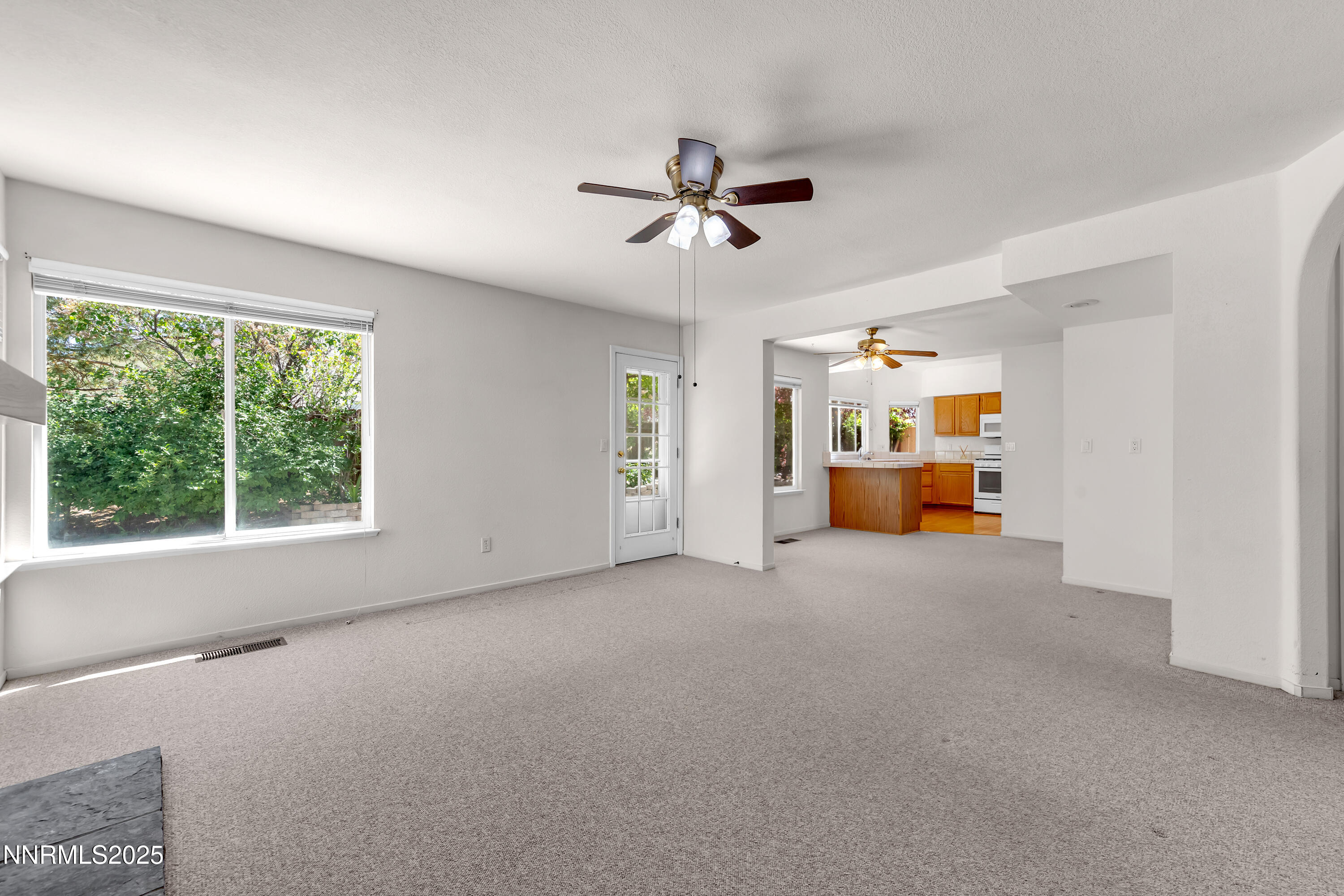 1850 Tess Way Reno, NV 89511 - Photo 16 of 50 a view of empty room with windows