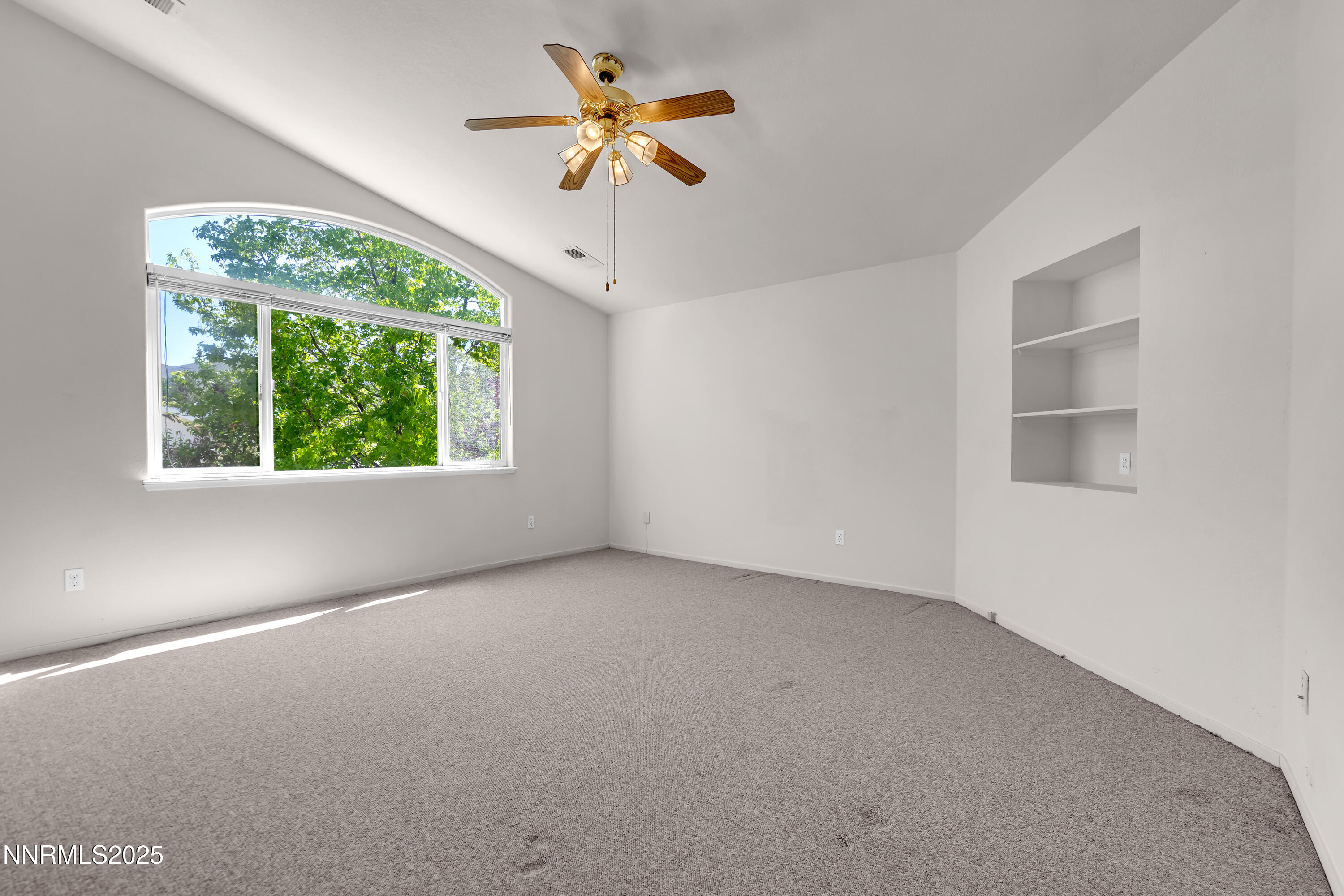 1850 Tess Way Reno, NV 89511 - Photo 22 of 50 wooden floor in an empty room with a window