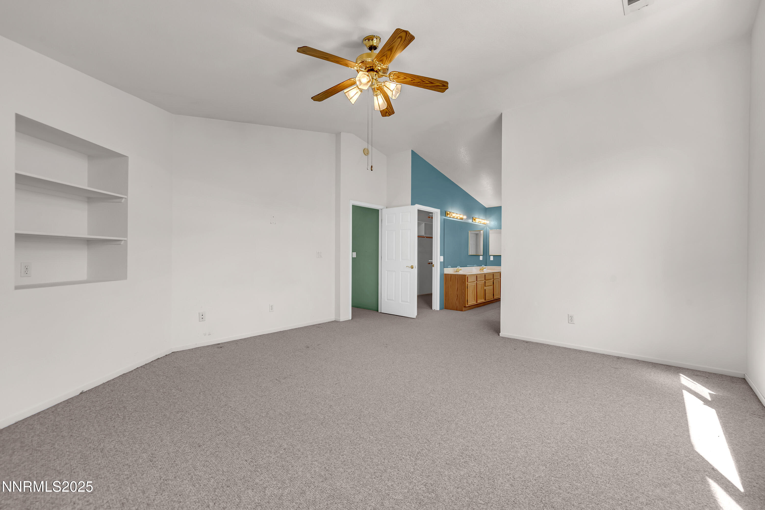 1850 Tess Way Reno, NV 89511 - Photo 24 of 50 a view of an empty room with a ceiling fan