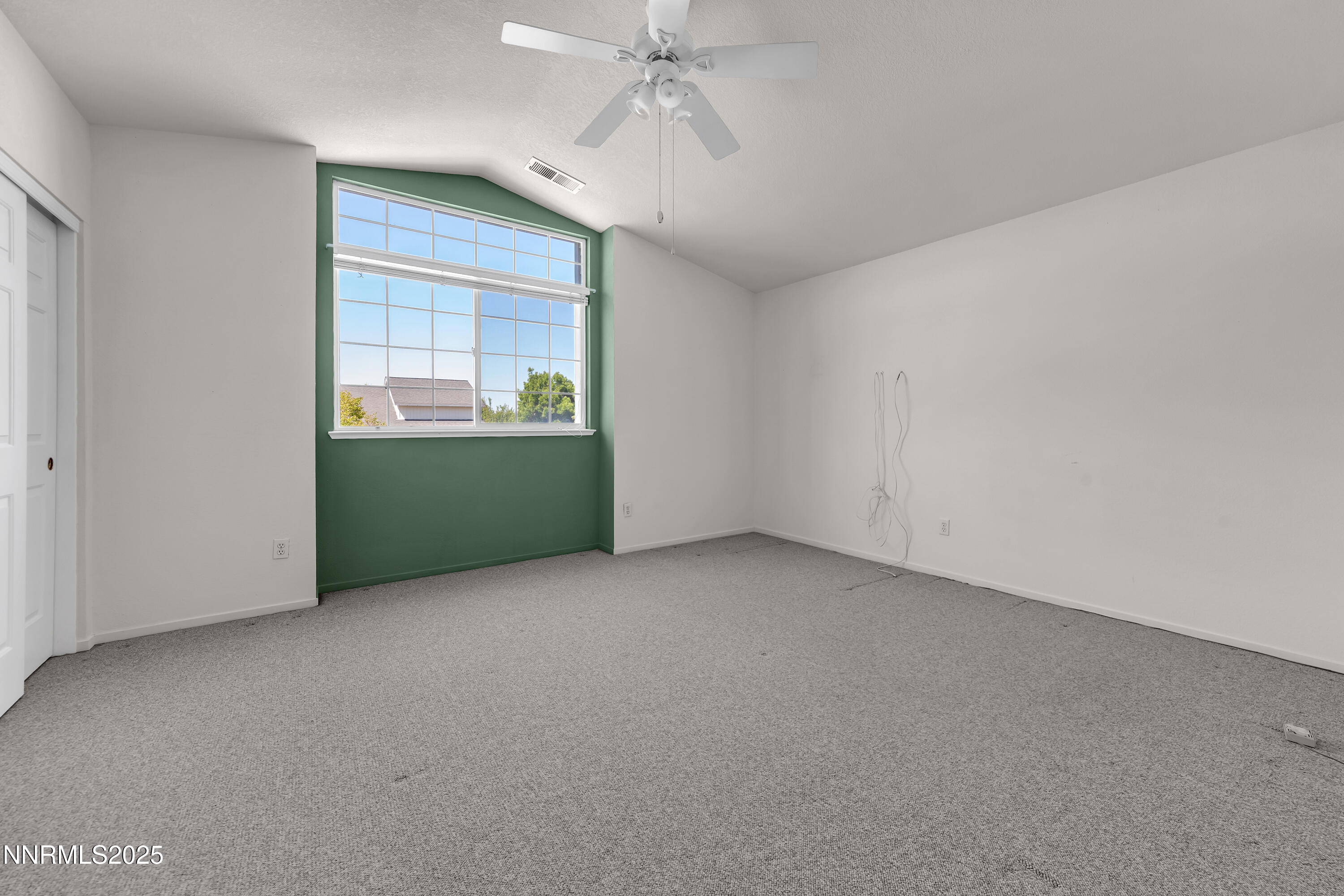 1850 Tess Way Reno, NV 89511 - Photo 30 of 50 an empty room with a kitchen and windows