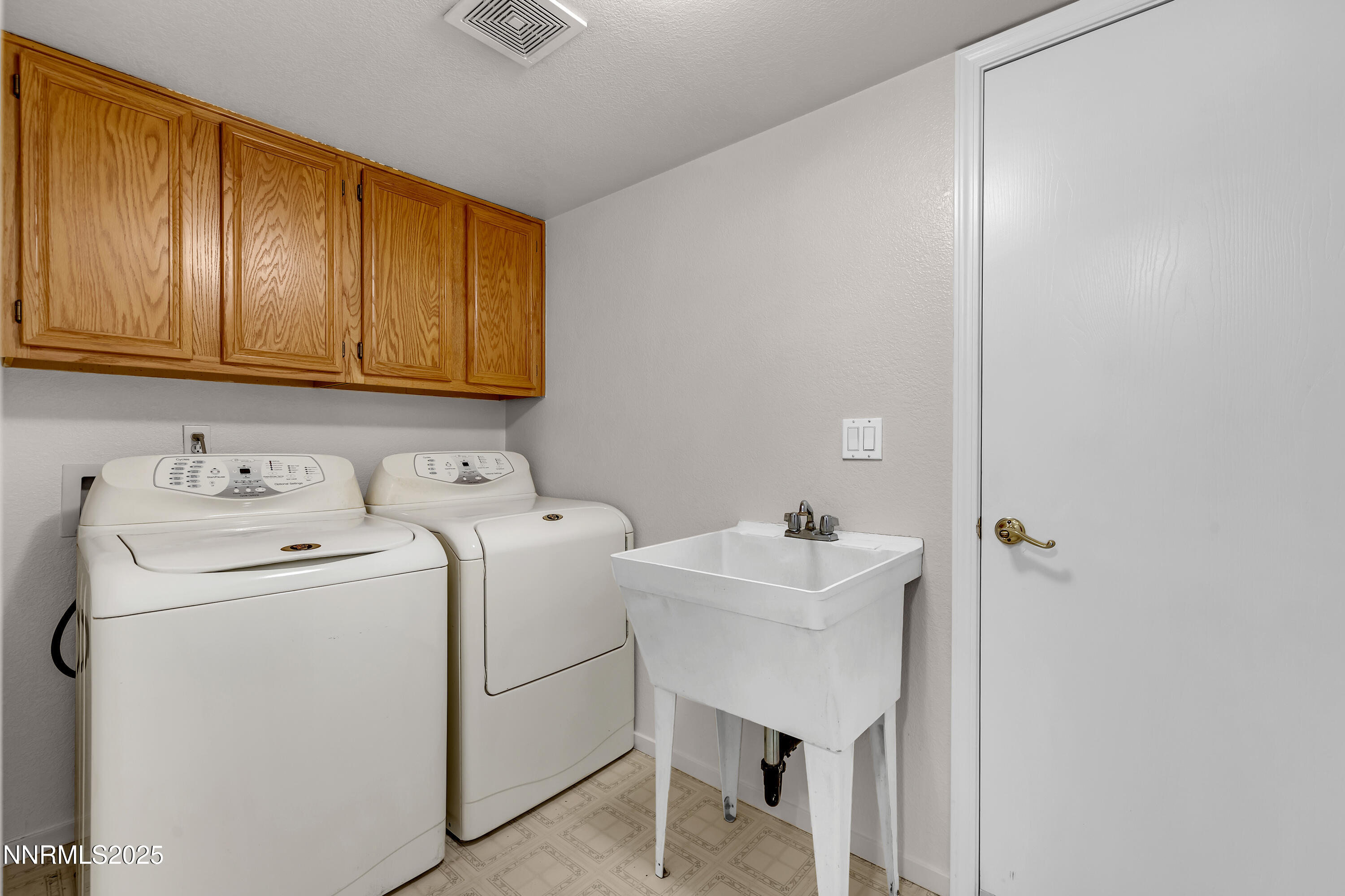 1850 Tess Way Reno, NV 89511 - Photo 38 of 50 a utility room with dryer and washer