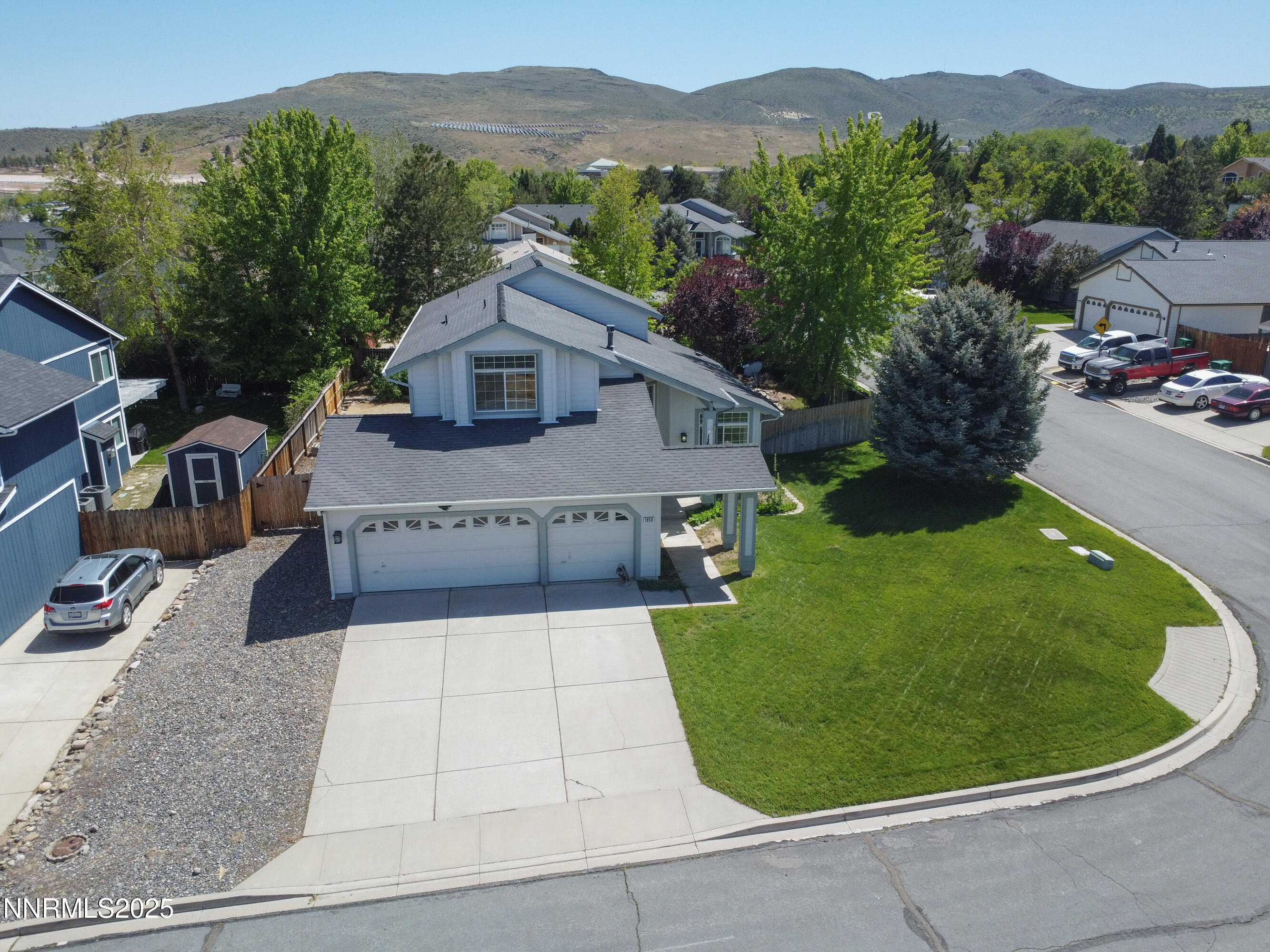 1850 Tess Way Reno, NV 89511 - Photo 39 of 50 a view of a house with a garden and a pathway