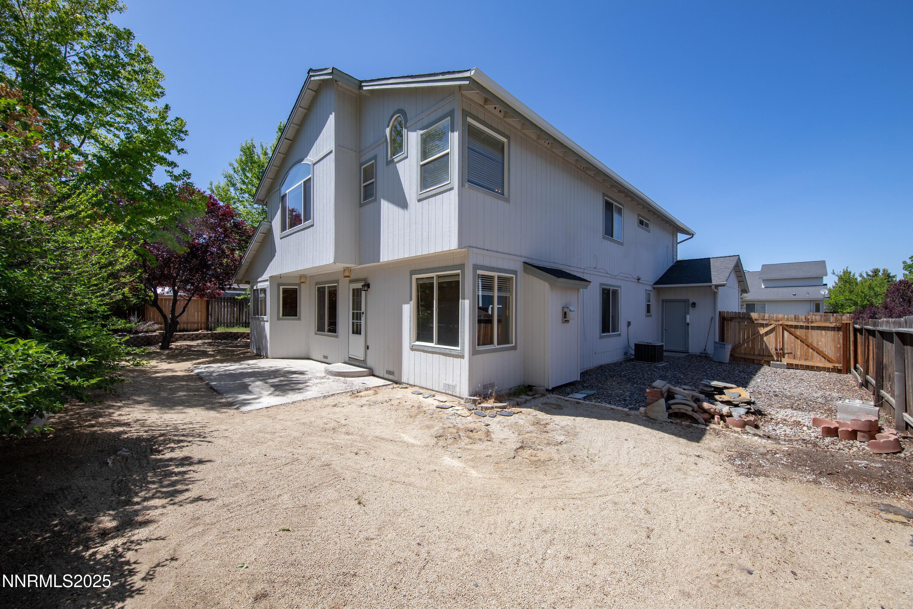1850 Tess Way Reno, NV 89511 - Photo 42 of 50 a view of a house with a yard