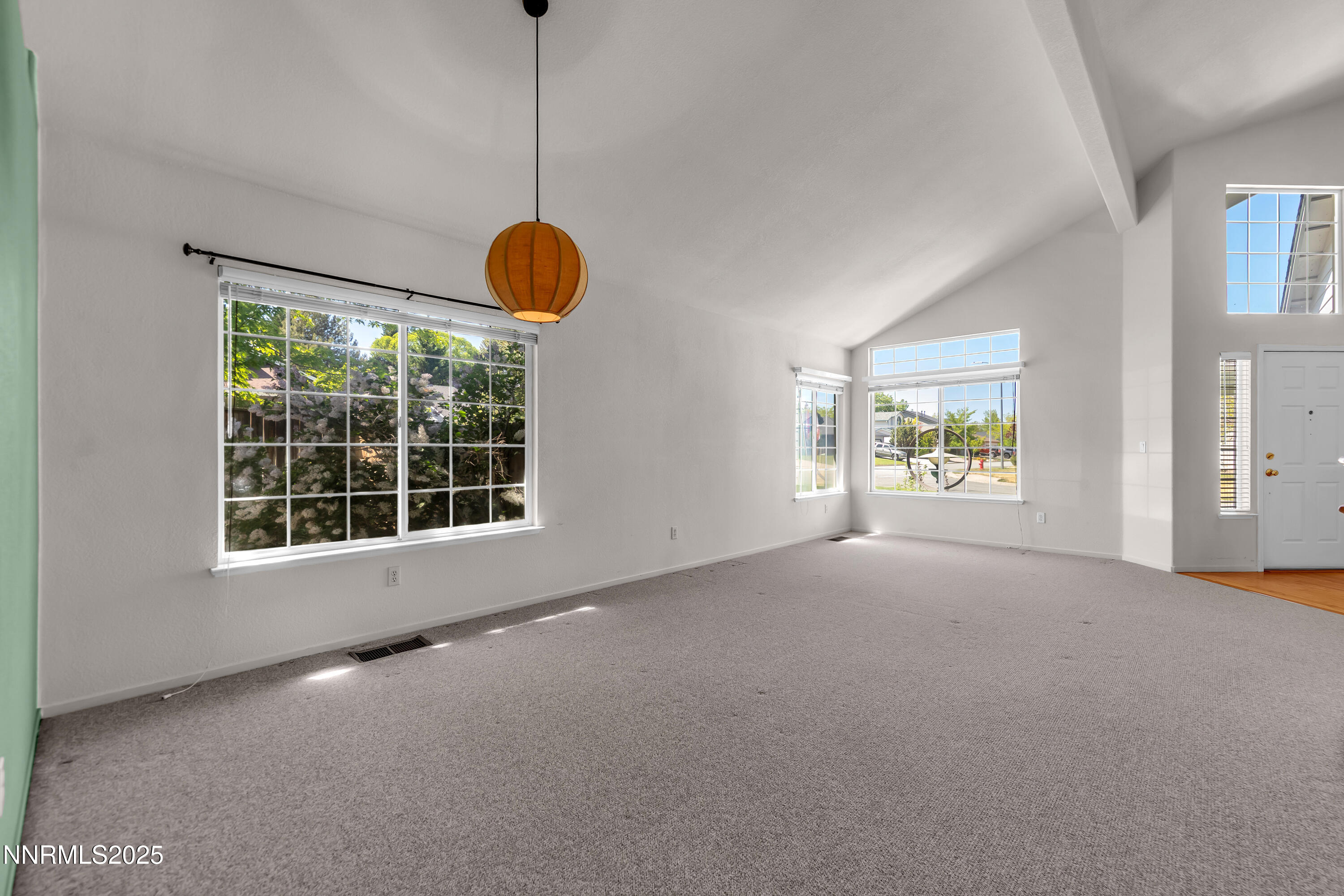 1850 Tess Way Reno, NV 89511 - Photo 6 of 50 a view of an empty room with a window and storage