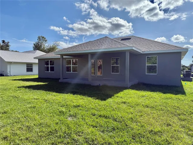 a house view with a garden space