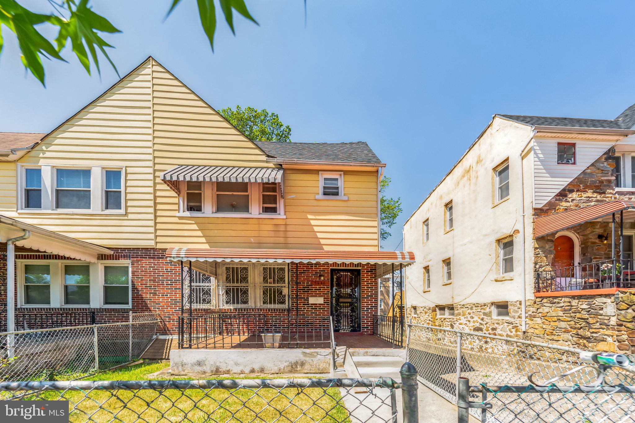 5446 Narcissus Avenue, Unit 1 Baltimore, MD 21215 - Photo 1 of 21 a view of a house with a swimming pool