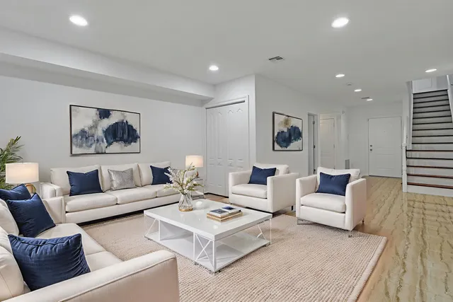 a living room with furniture and a couch