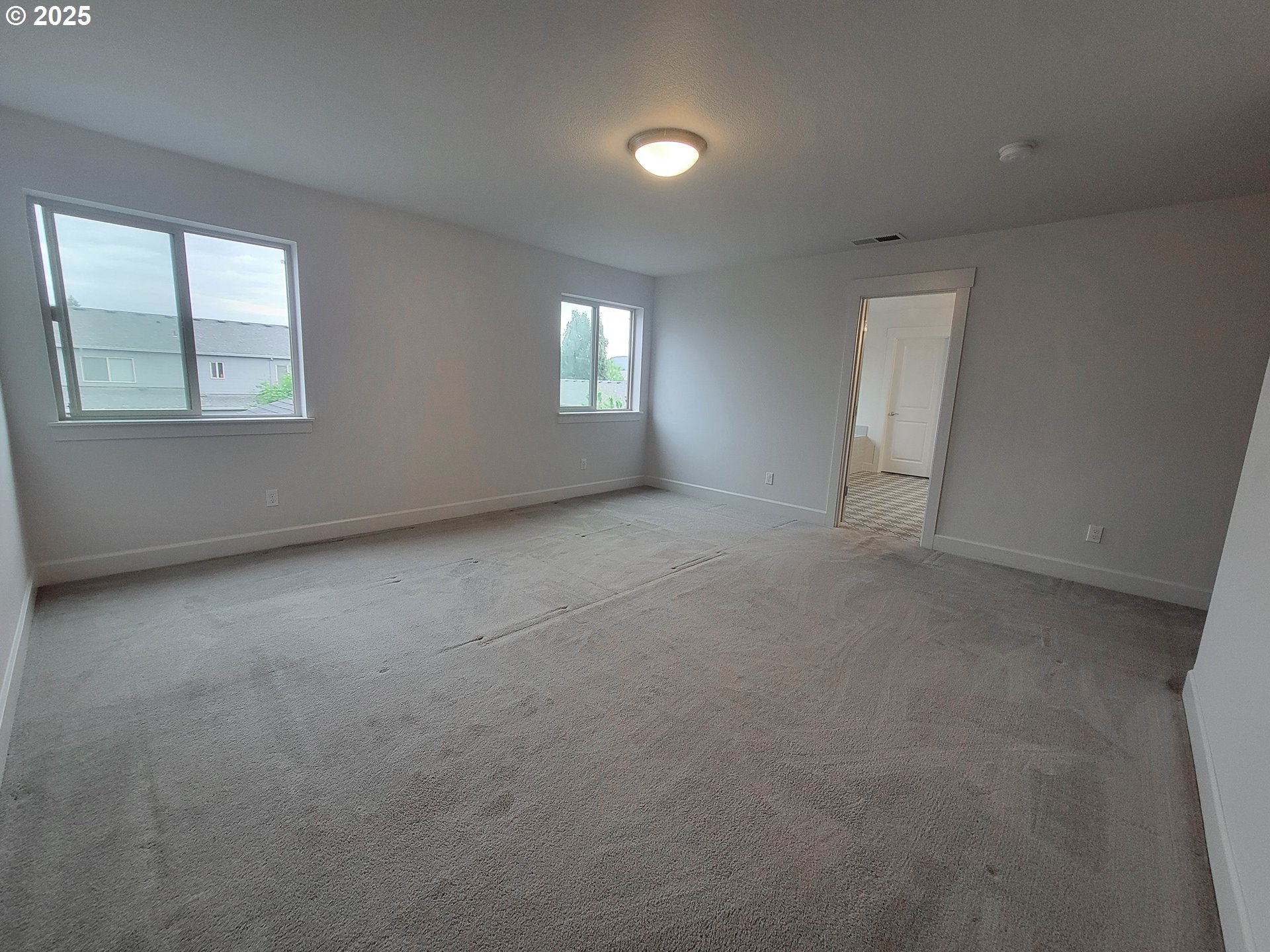 1222 Brookside Avenue Forest Grove, OR 97116 - Photo 17 of 30 an empty room with windows and closet