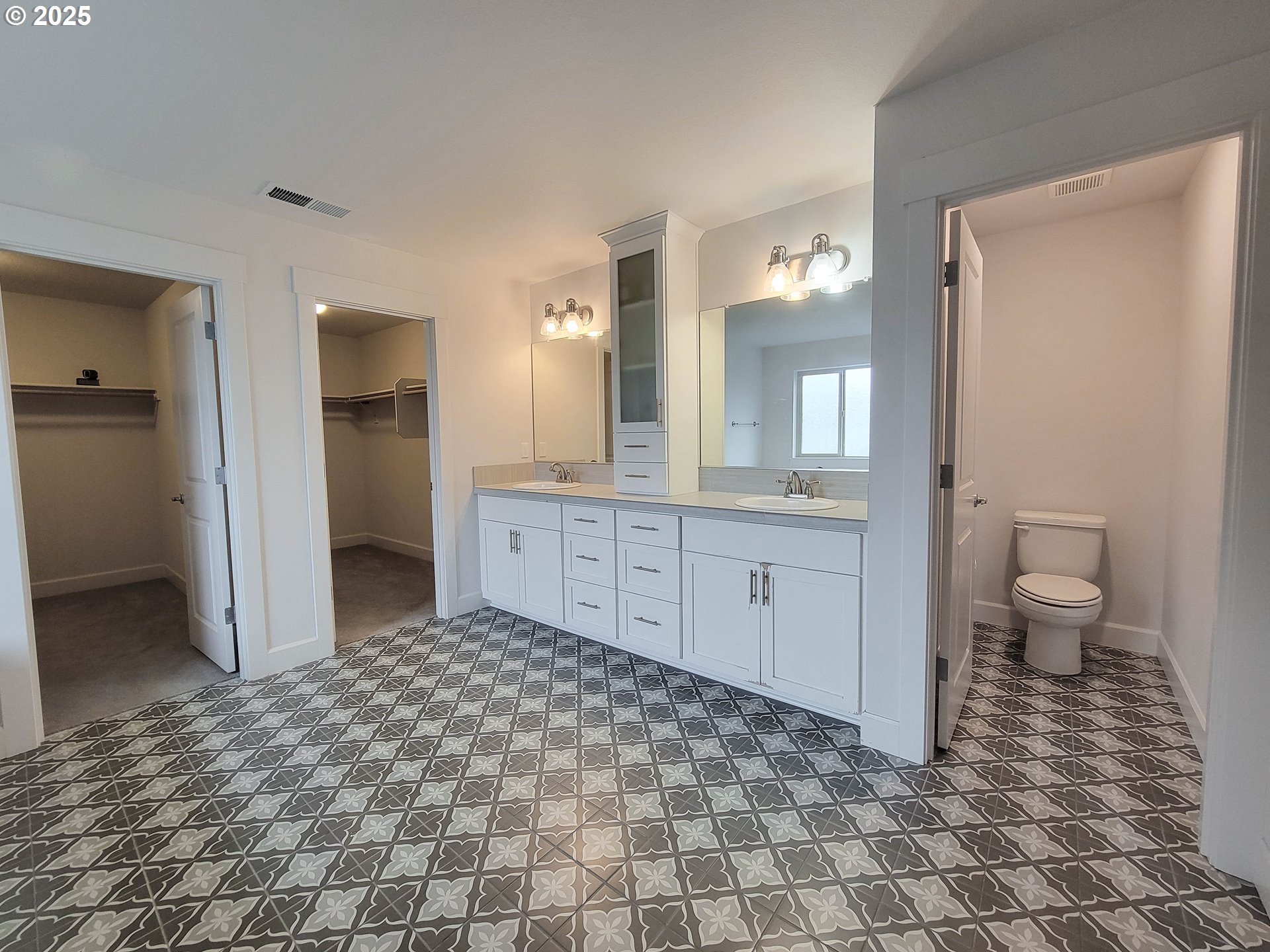 1222 Brookside Avenue Forest Grove, OR 97116 - Photo 19 of 30 a large bathroom with a sink a toilet and a mirror