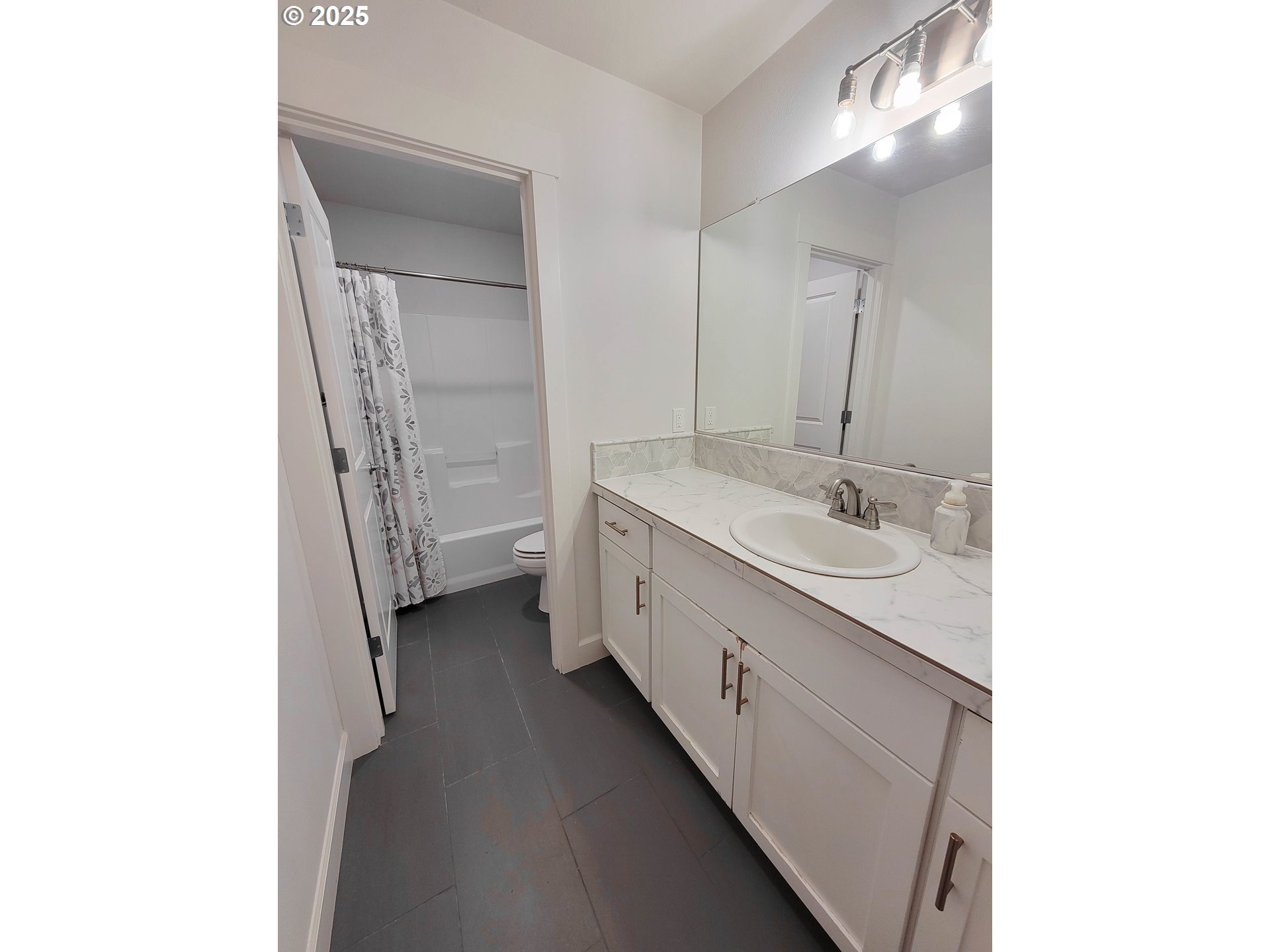 1222 Brookside Avenue Forest Grove, OR 97116 - Photo 26 of 30 a bathroom with a double vanity sink a and mirror