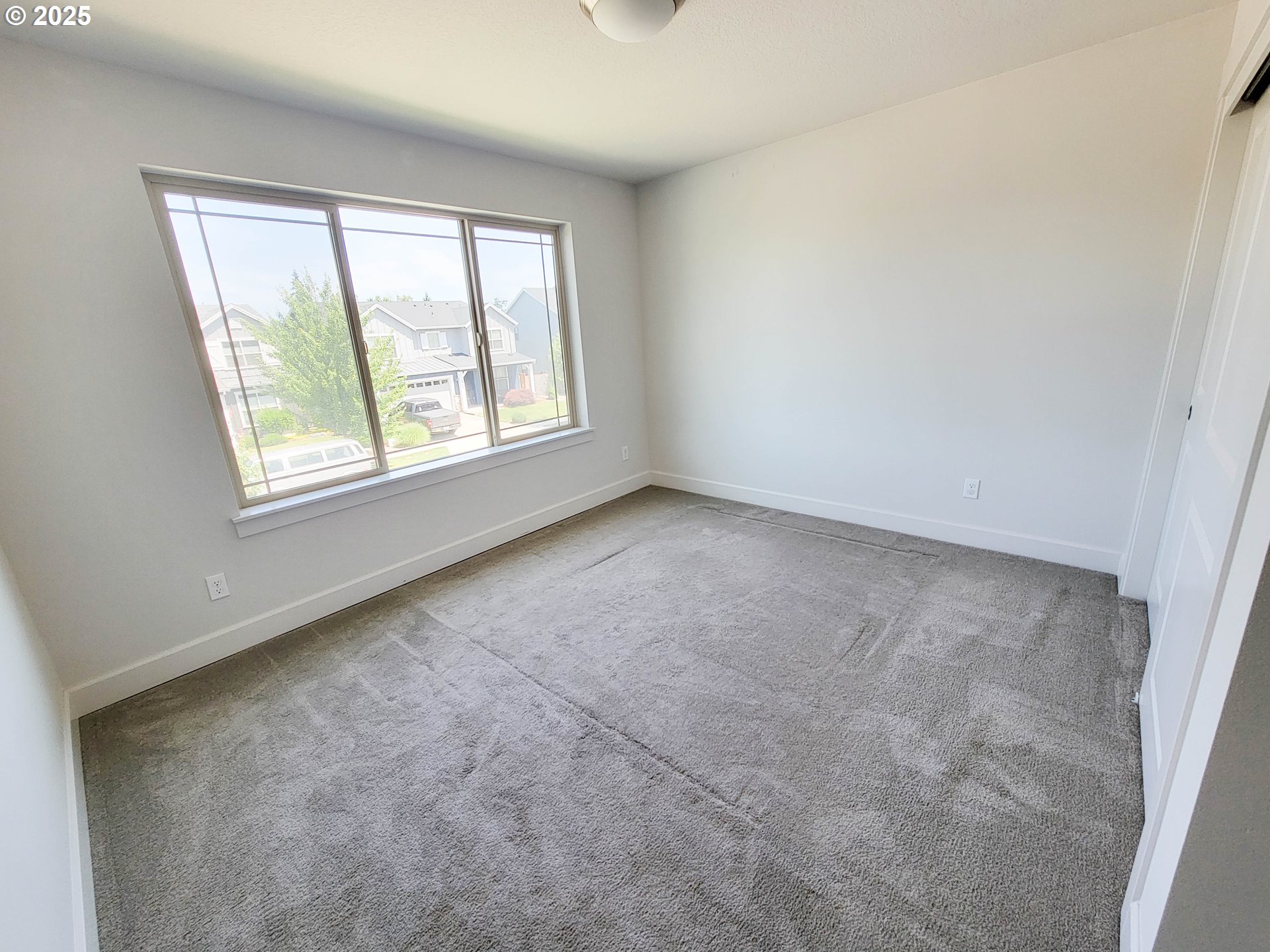 1222 Brookside Avenue Forest Grove, OR 97116 - Photo 27 of 30 an empty room with a window