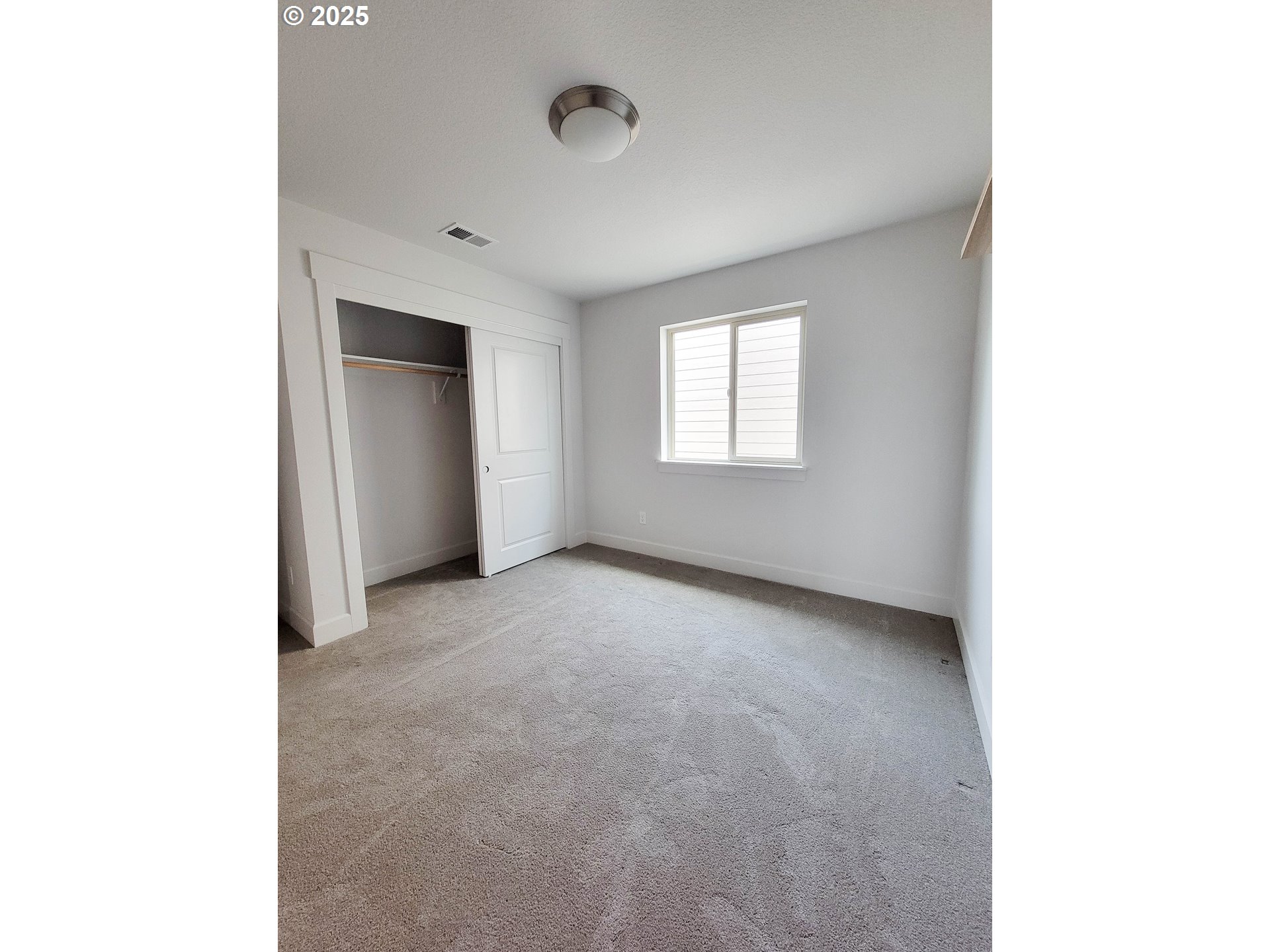 1222 Brookside Avenue Forest Grove, OR 97116 - Photo 28 of 30 a view of an empty room with a window