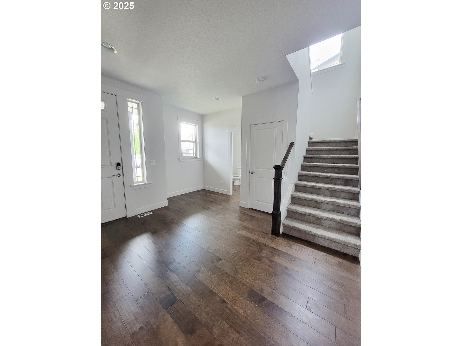 1222 Brookside Avenue Forest Grove, OR 97116 - Photo 3 of 30 a view of a livingroom with wooden floor
