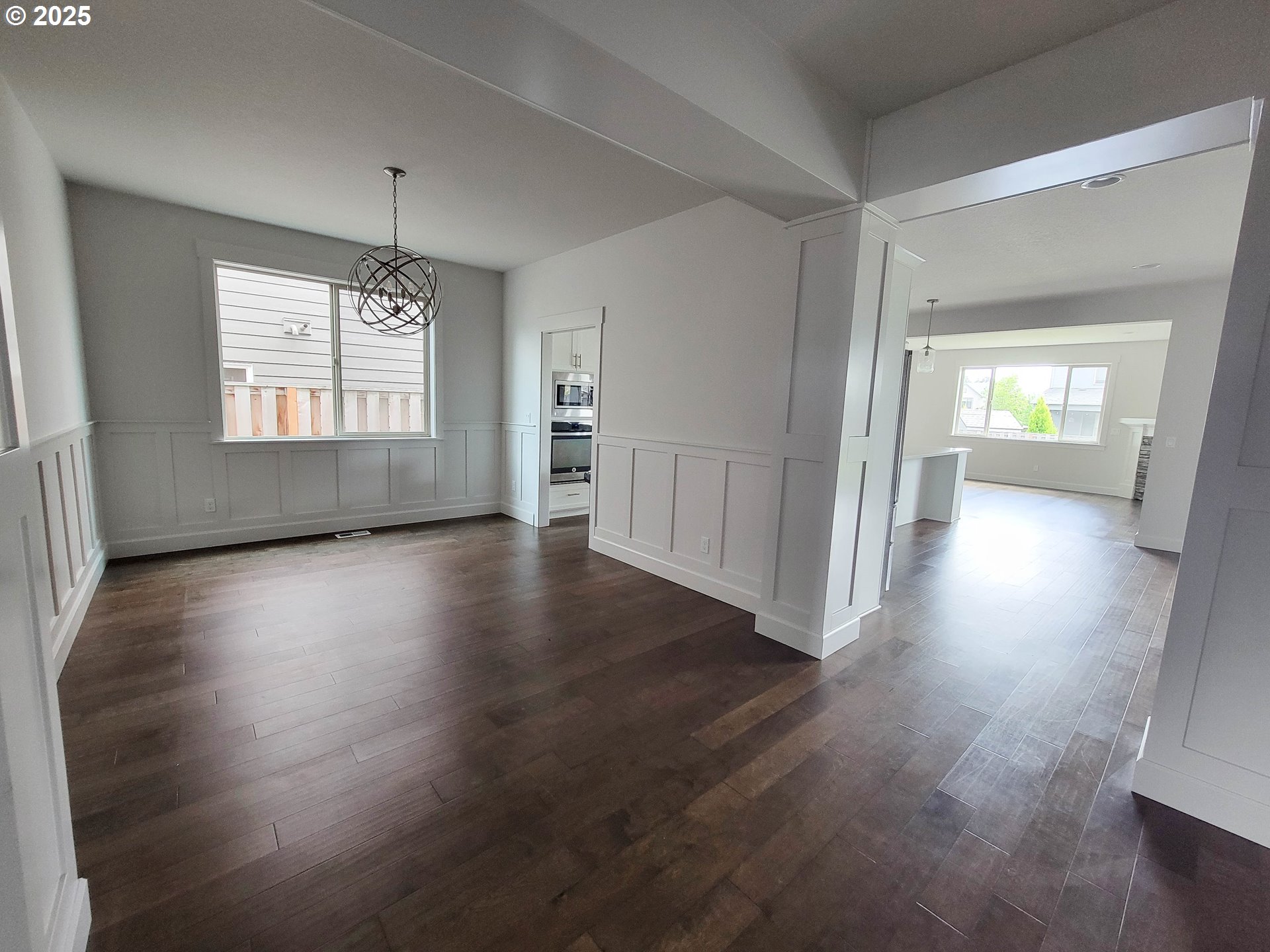 1222 Brookside Avenue Forest Grove, OR 97116 - Photo 5 of 30 an empty room with wooden floor and windows
