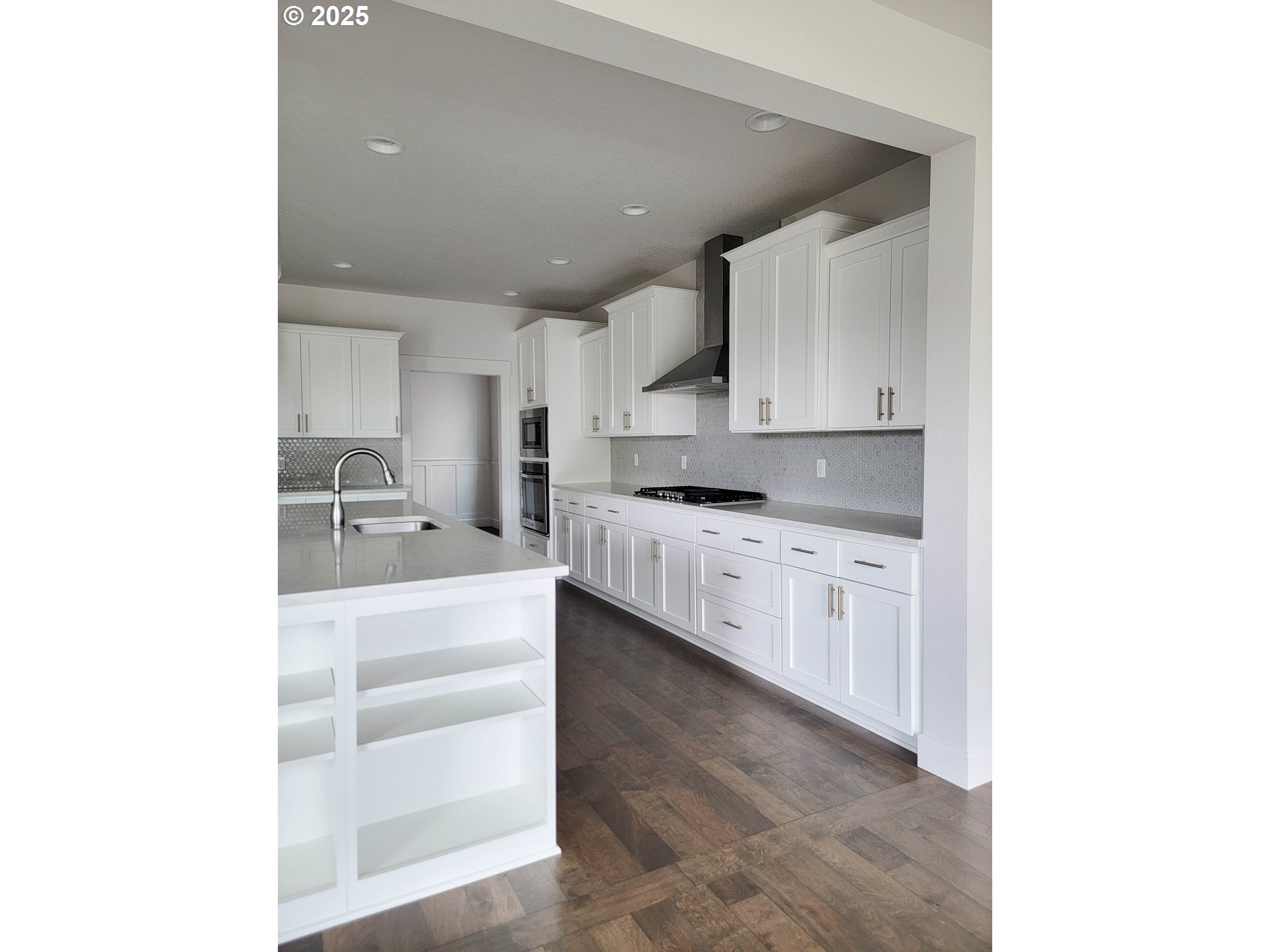 1222 Brookside Avenue Forest Grove, OR 97116 - Photo 10 of 30 a kitchen with granite countertop white cabinets and white appliances