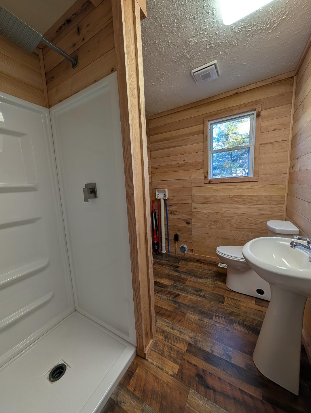 11774 Hopkinsville Road Princeton, KY 42445 - Photo 16 of 25 a bathroom with a sink a toilet and shower