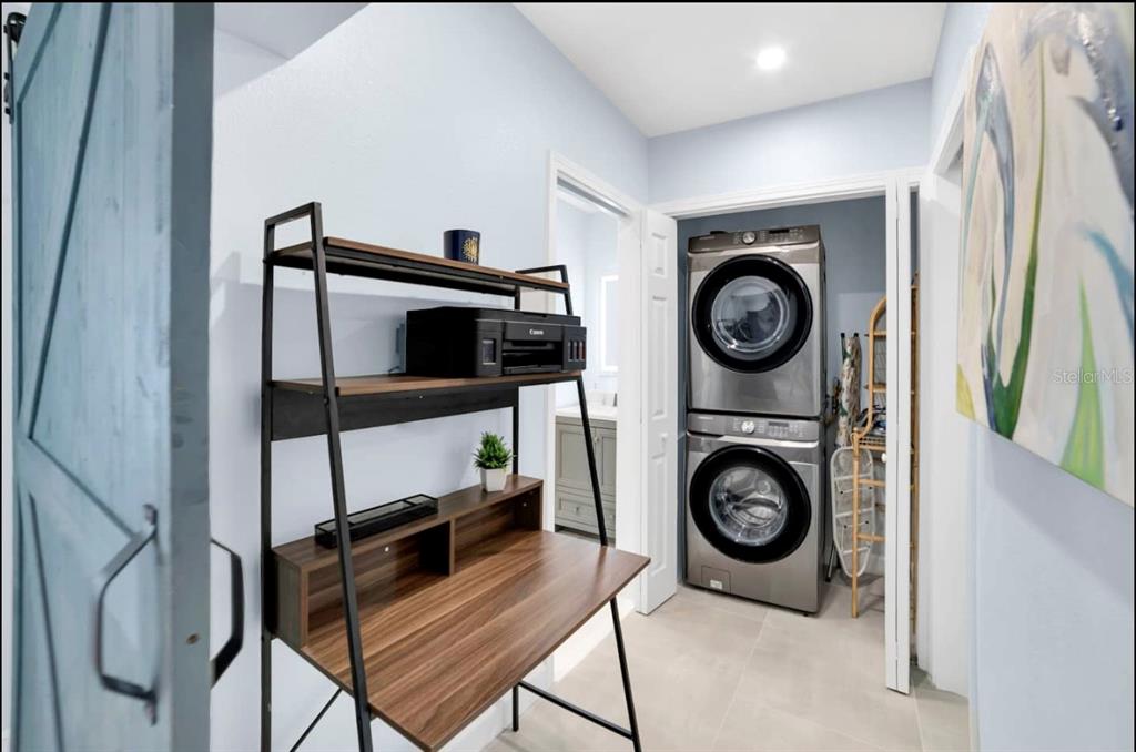 1210 Bay Palm Boulevard Indian Rocks Beach, FL 33785 - Photo 14 of 19 a view of storage and utility room with washer and dryer