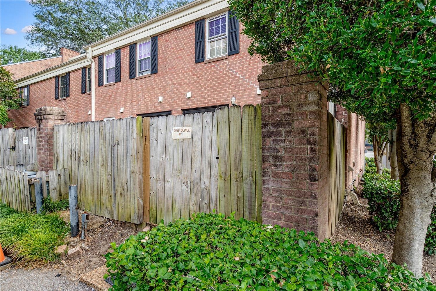 5696 Quince Road, Unit 1 Memphis, TN 38119 - Photo 24 of 26 View of side of home featuring brick siding