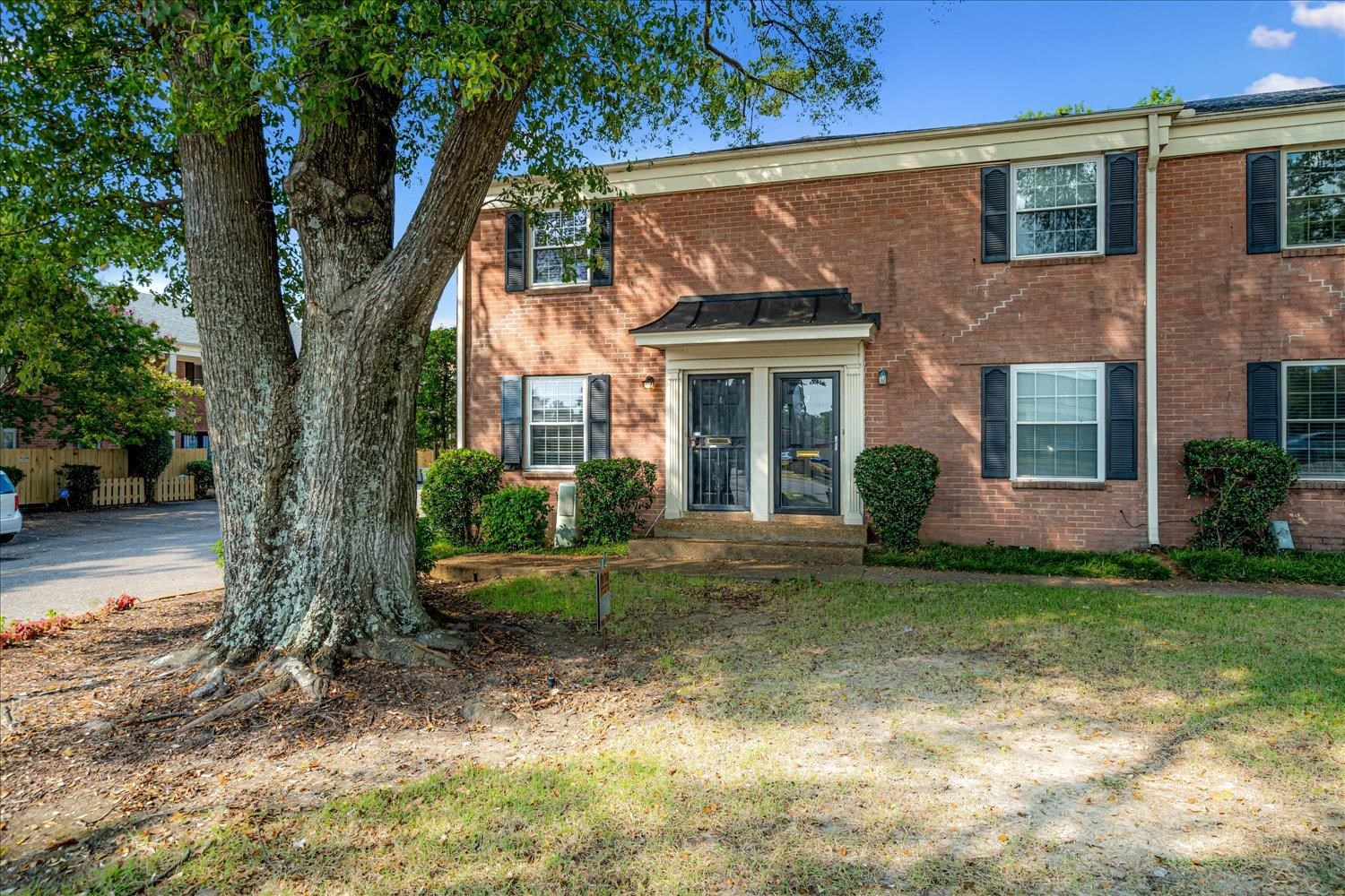 5696 Quince Road, Unit 1 Memphis, TN 38119 - Photo 25 of 26 View of front of house featuring brick siding