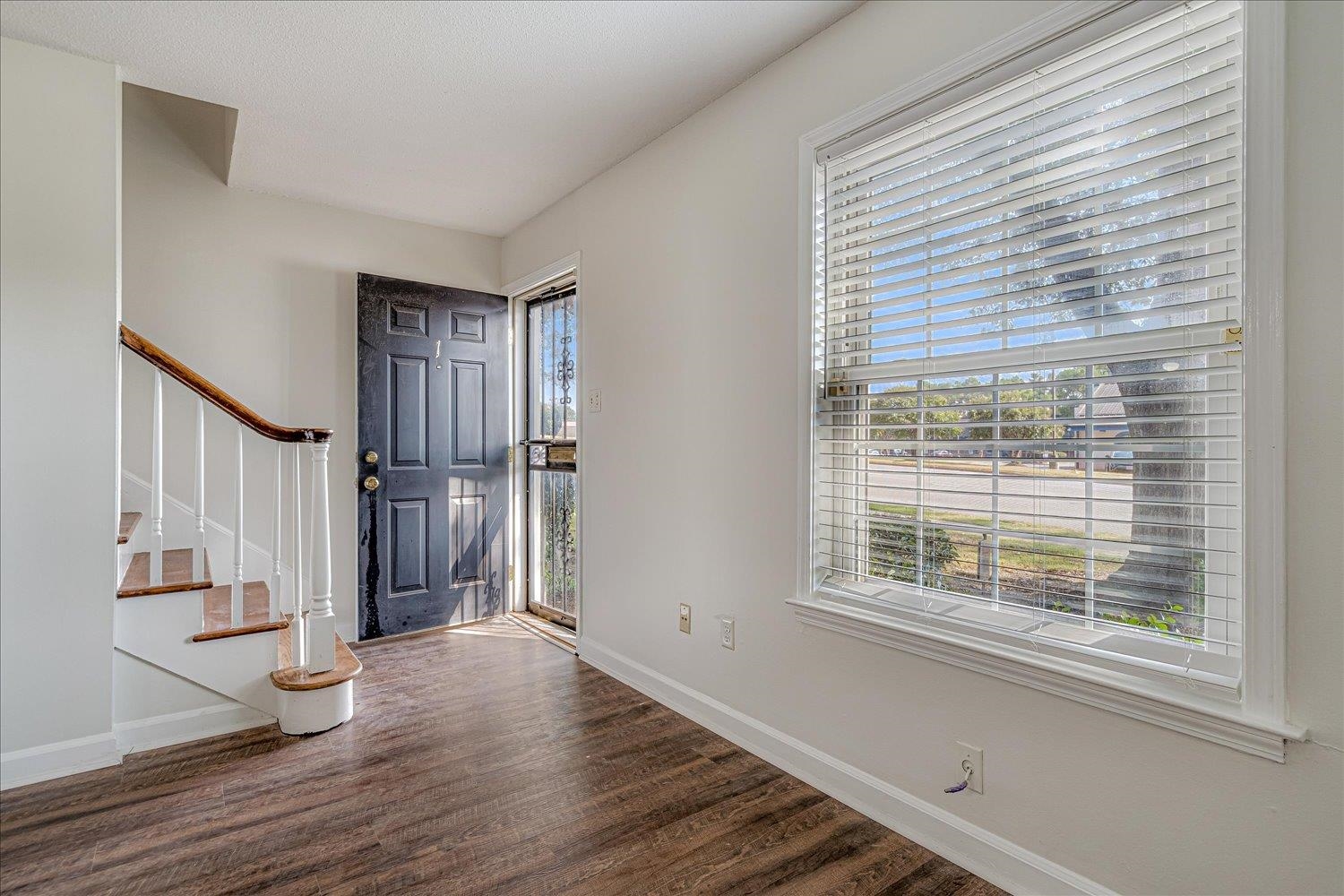 5696 Quince Road, Unit 1 Memphis, TN 38119 - Photo 7 of 26 Foyer featuring plenty of natural light, wood finished floors, and stairway