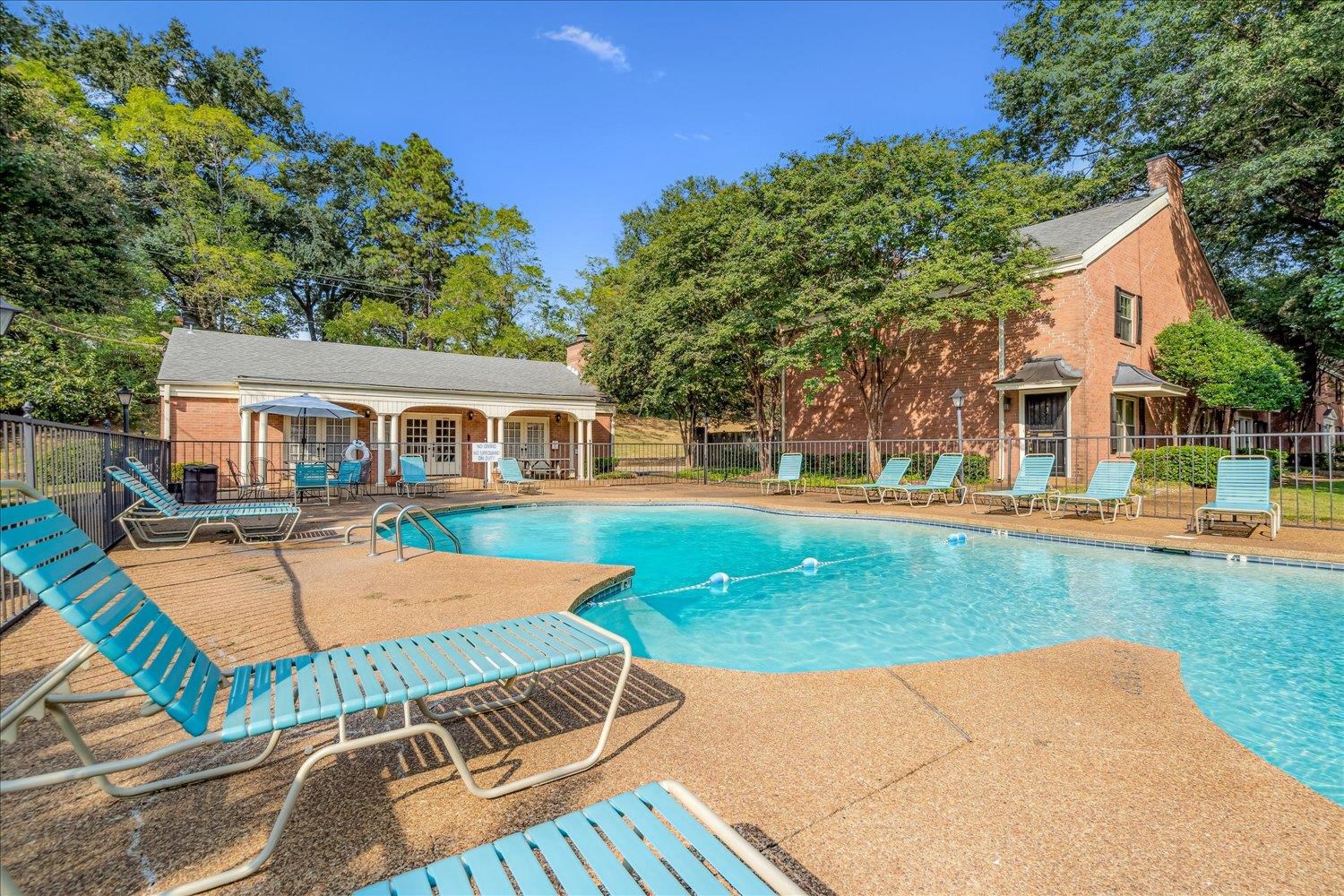 5696 Quince Road, Unit 1 Memphis, TN 38119 - Photo 10 of 26 a view of a house with swimming pool and a yard