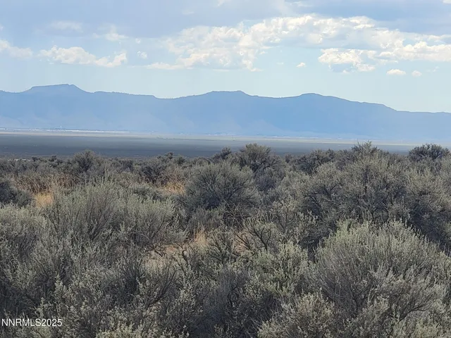 a view of a mountain in the distance in the distance