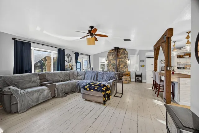 a dining room with furniture and window