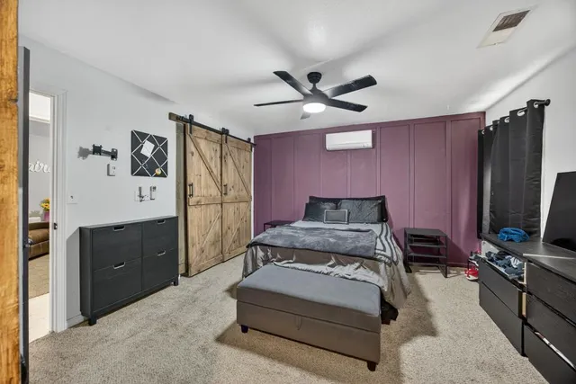 a bathroom with a sink a mirror and a bathtub