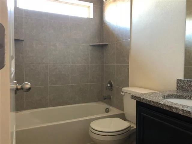 a room with a table and a mirror