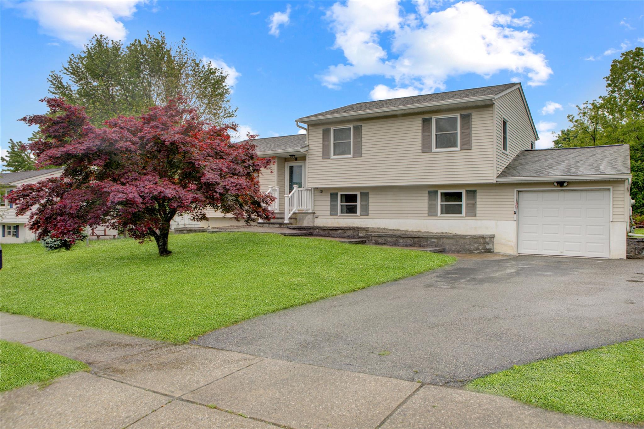 a house view with a garden space