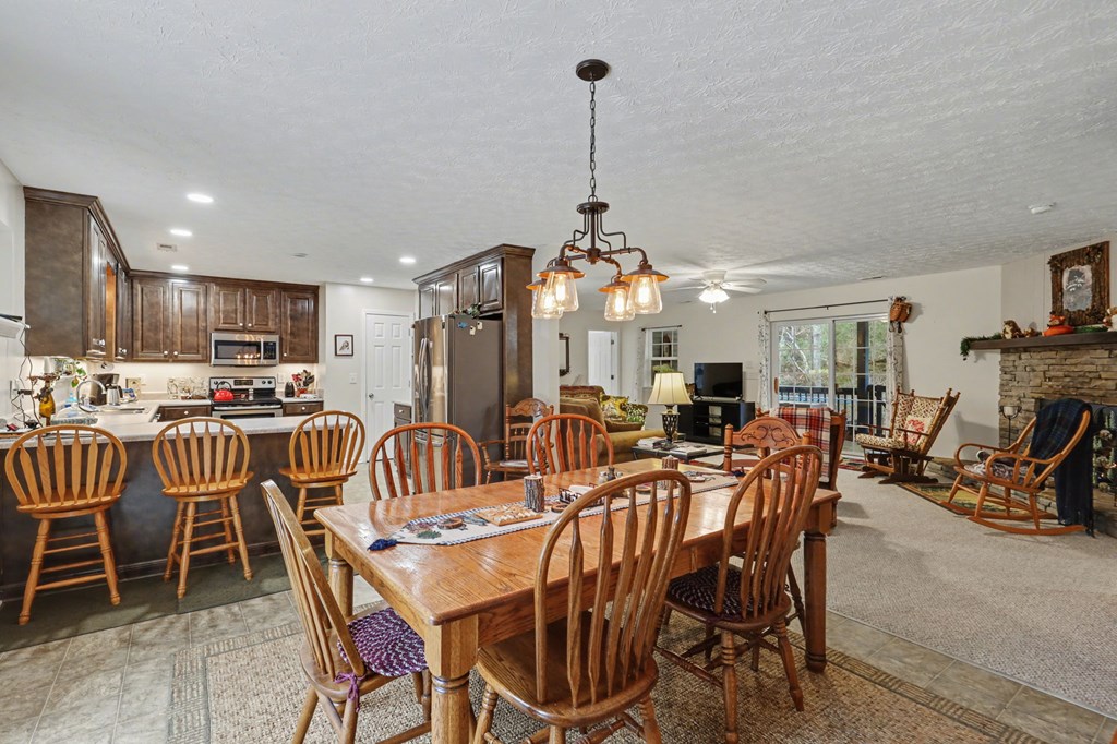 4790 Fires Creek Road Hayesville, NC 28904 - Photo 14 of 61 a view of a dining room with furniture