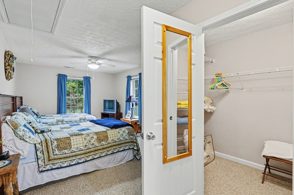 4790 Fires Creek Road Hayesville, NC 28904 - Photo 34 of 61 a bedroom with a bed and a window